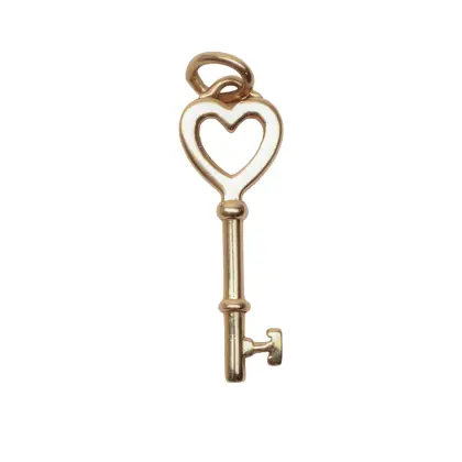TIFFANY & CO DIJE LLAVE EN ORO AMARILLO