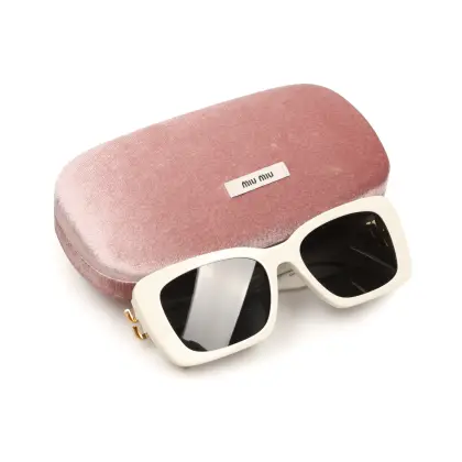 MIU MIU LENTES DE SOL